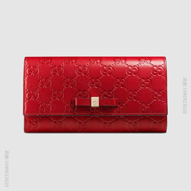 388679 Gucci Signature系列 热压皮革 蝴蝶结 长款皮夹...