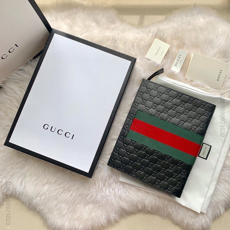GUCCI古驰钱包475316古驰古驰Signature材质压花手拿包古驰手拿包黑色高仿古驰钱包价格 475316 CWCLN 1060
