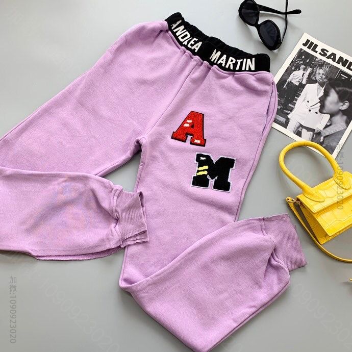 Andrea Martin 20AW爆款.早秋新品 开衩徽章卫裤