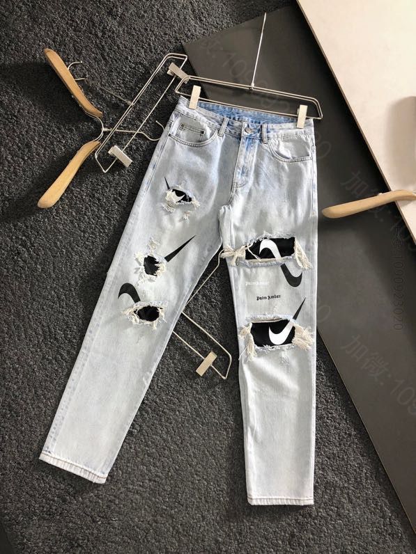 M101855_潮牌男装牛仔裤 NIK顶级浅蓝色印花贴标破洞倒勾系列休闲牛仔裤 原单潮牌牛仔裤