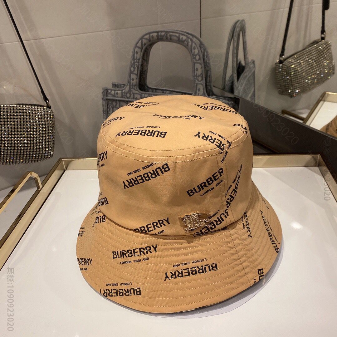 Burberry博柏利满印logo防水布渔夫帽