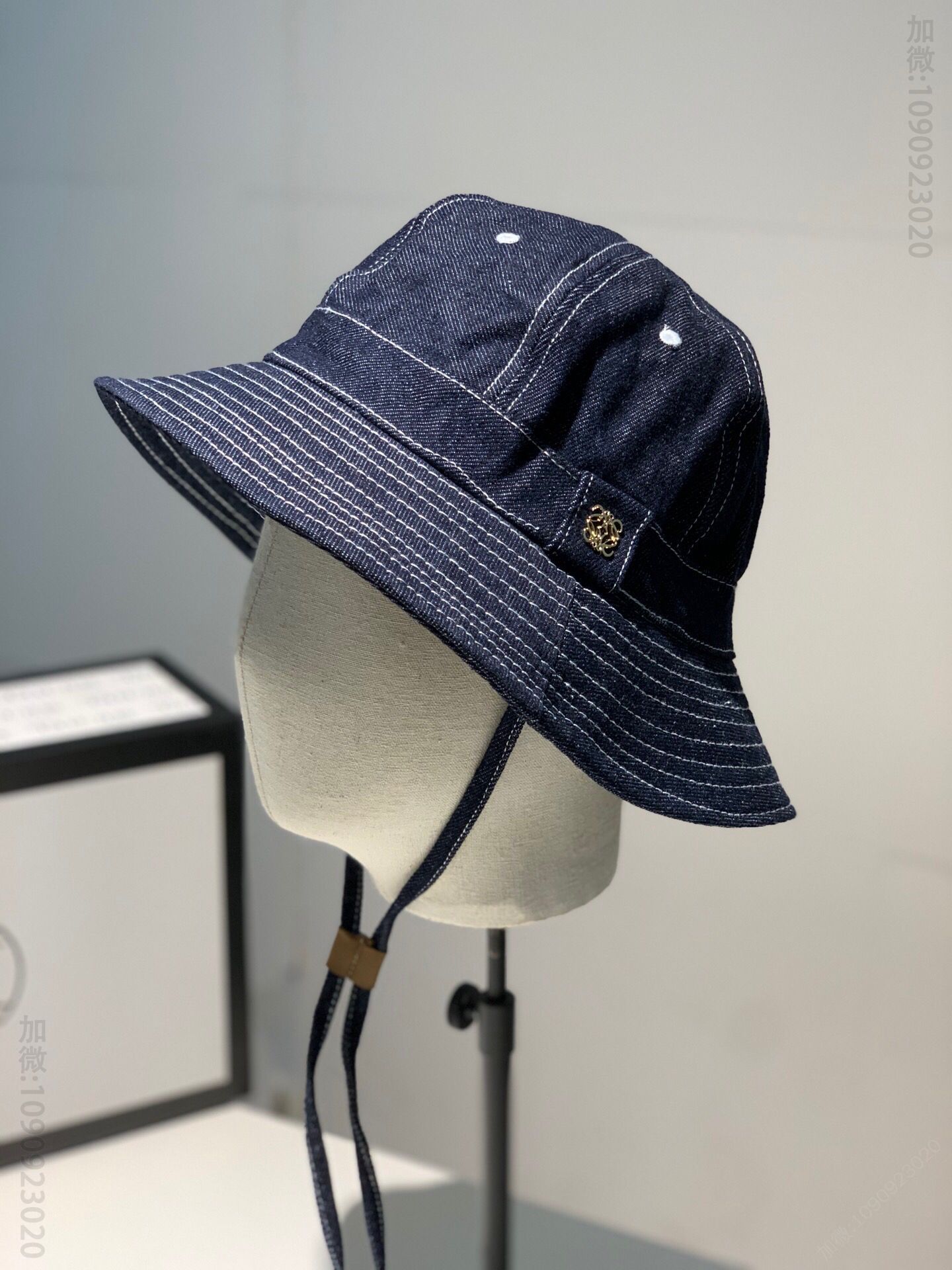 LOEWE罗意威2023春夏新款牛仔帆布拼接撞色渔夫帽礼帽