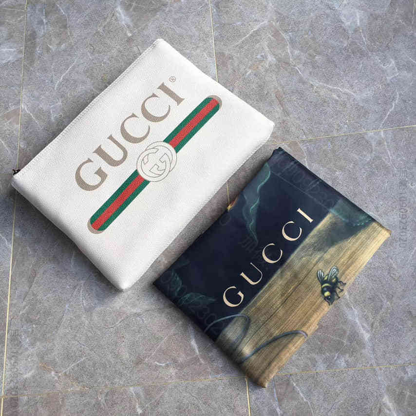 Gucci/古驰G牌秋冬新款涂鸦款手拿包