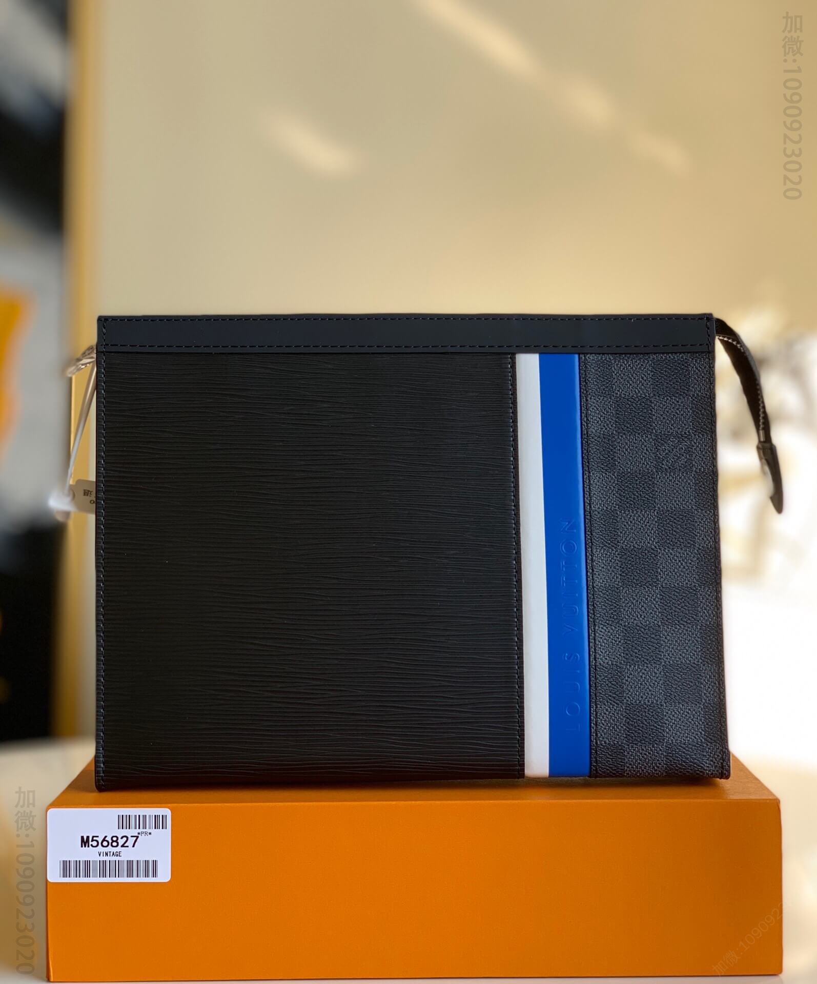 Louis Vuitton LV Pochette Voyage 手拿包 M56827