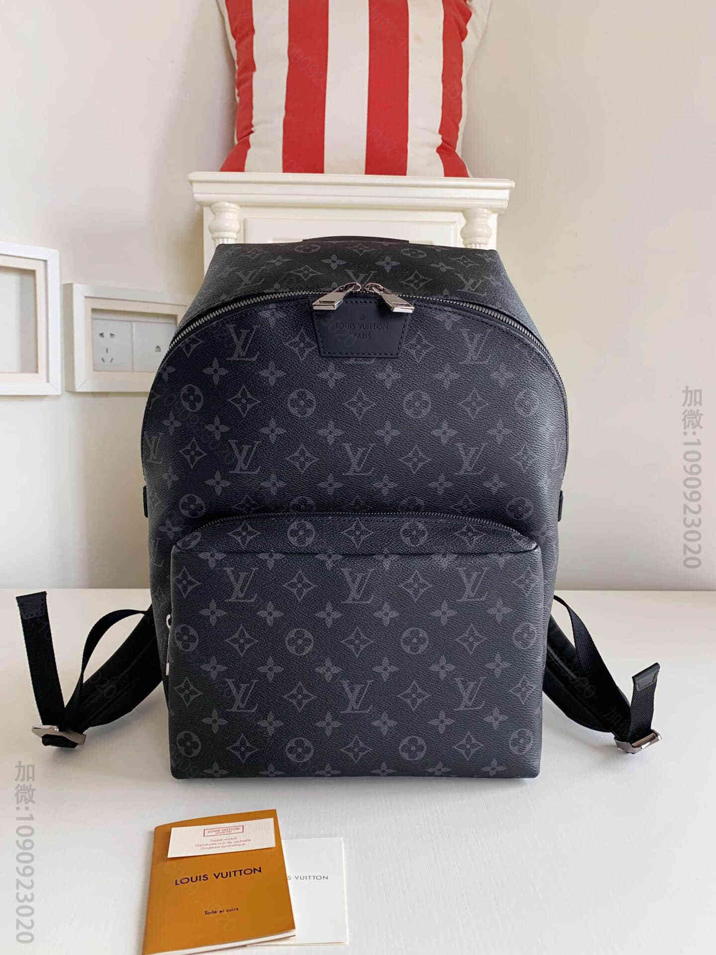 LV M43186 老款黑花Discovery双肩背包