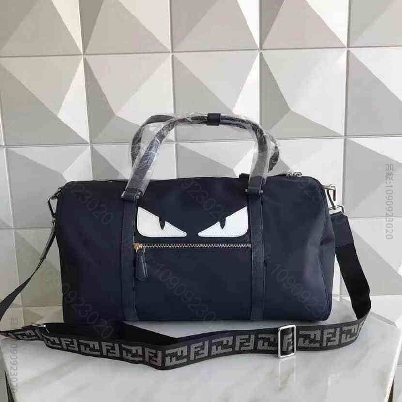芬迪FENDI277怪兽白眼睛装饰优质牛冿尼龙布旅行包