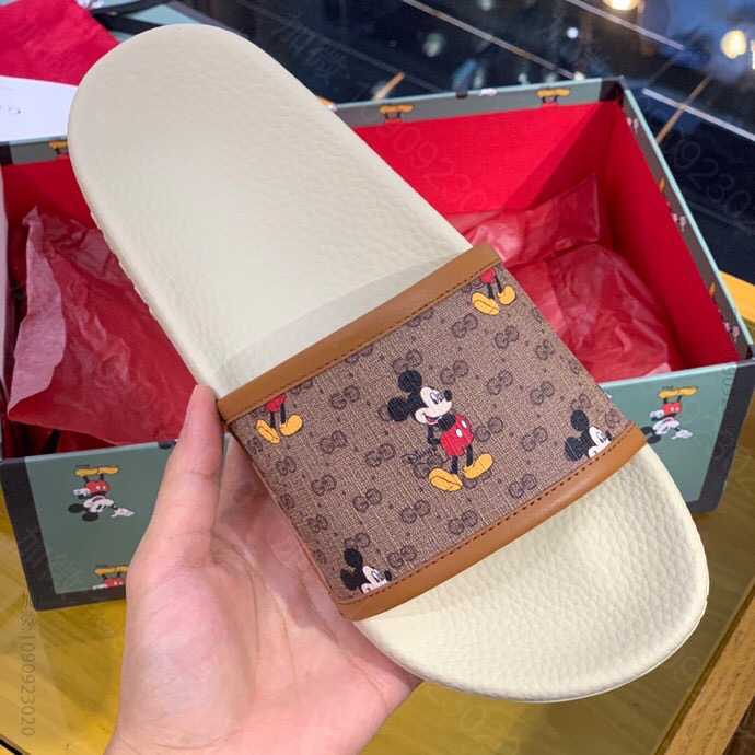 Gucci古驰 棕色/乌木色迷你GG Supreme高级人造帆布男女款拖鞋