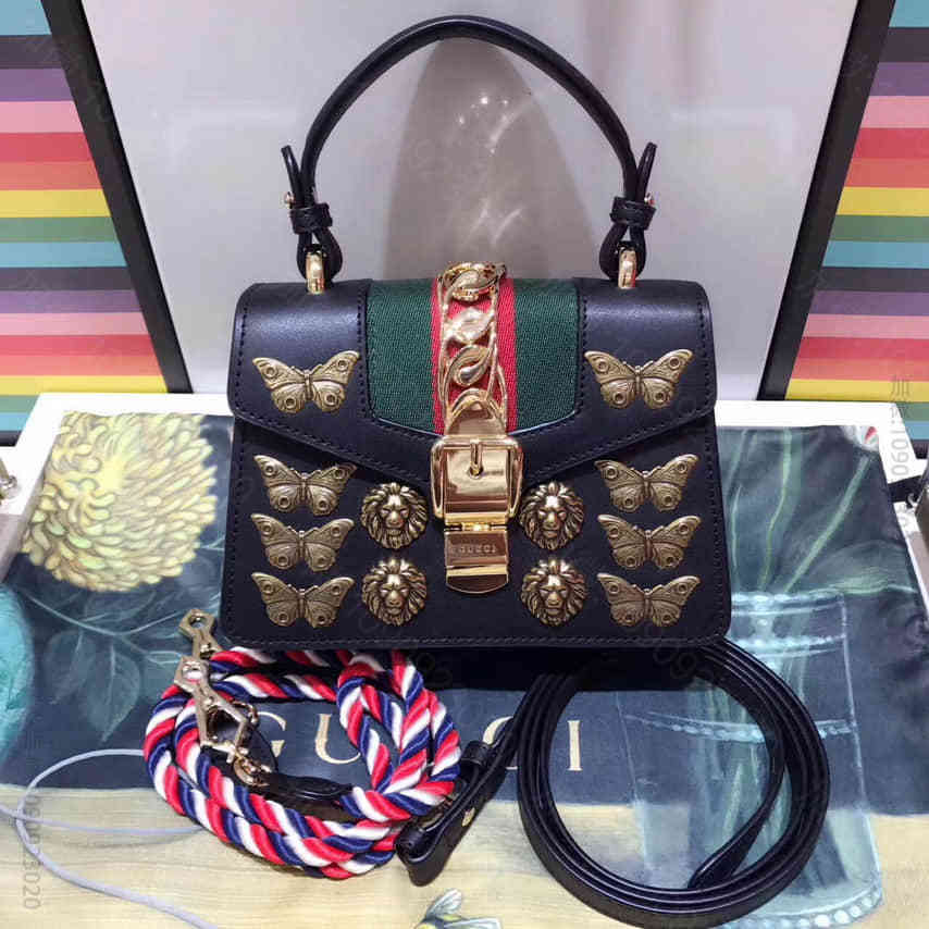 Gucci古驰 Mini Sylvie Animal Studs 蝴蝶狮子头...