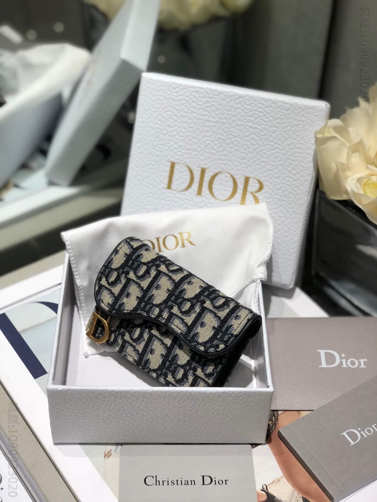 Dior 蓝色Oblique印花马鞍翻盖卡夹 S5611CTZQ_M928