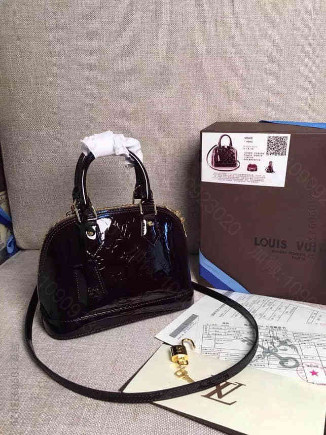 LV原单 M91606（专柜货）紫色 区别lv女包真假
