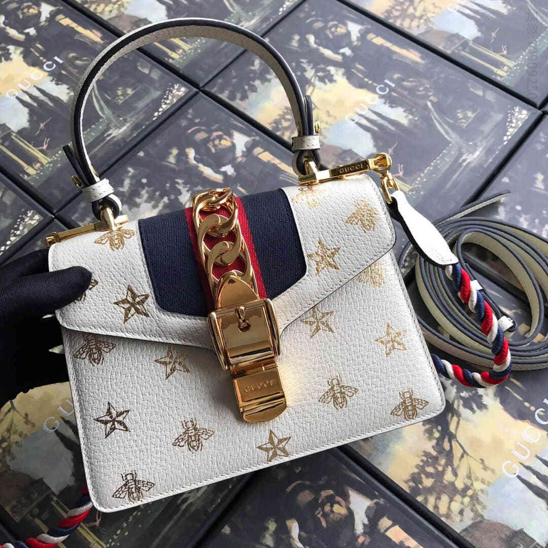 高仿古驰女士手提包 精品古驰手提包 Gucci/Sylvie系列饰金色蜜蜂和星星印花迷你手袋 470270A 