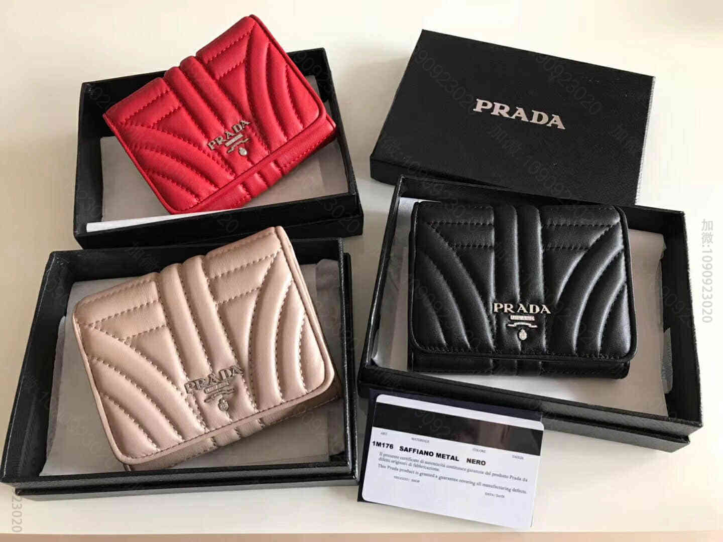 Prada/普拉达 小牛皮女士三折短夹 1M0176
