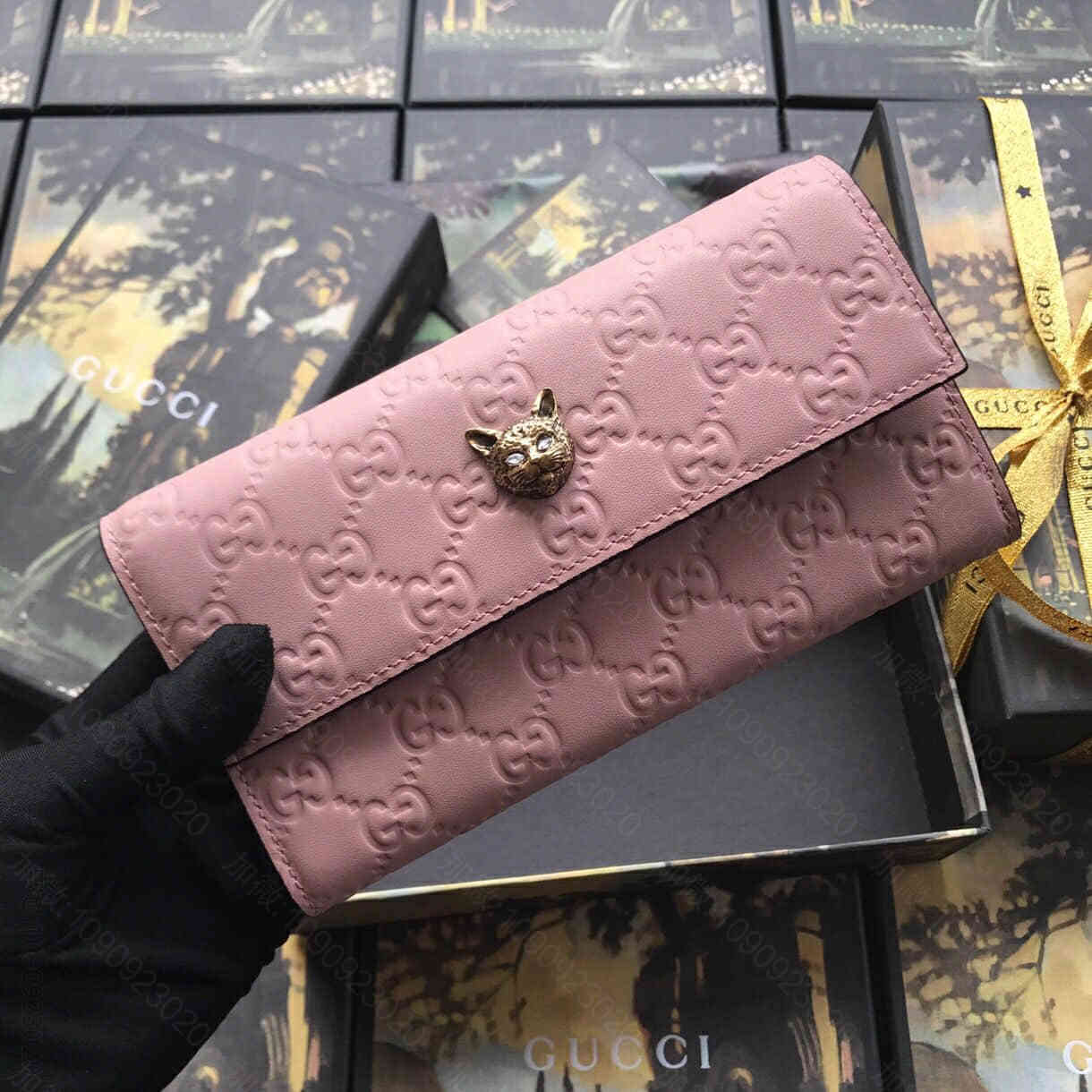 Gucci古驰/Signature系列猫头五金翻盖钱夹 548055