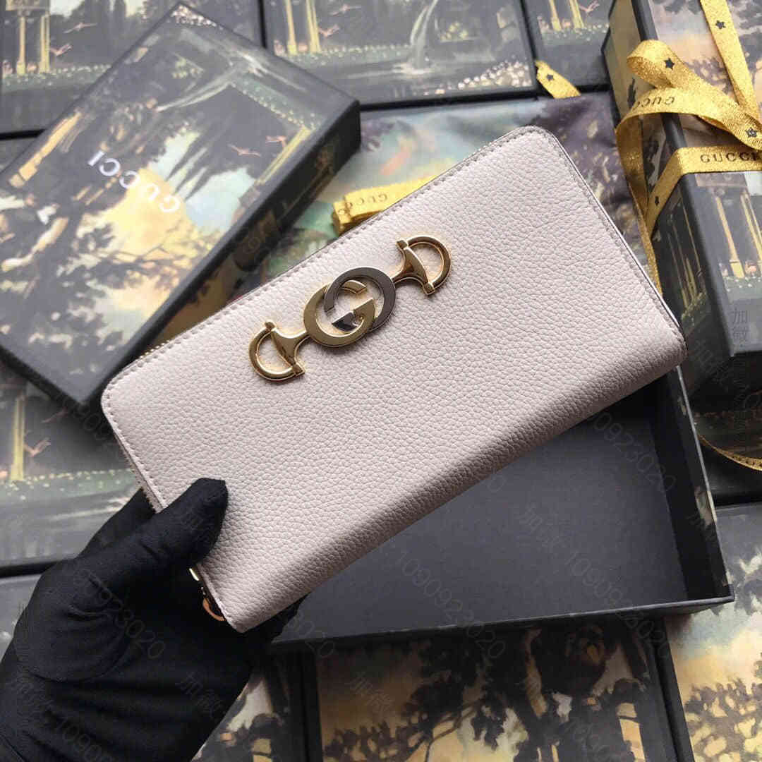 Gucci古驰 570661 互扣式马衔扣白全皮拉链钱包