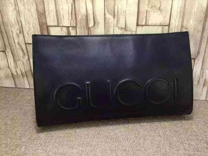 Gucci古驰 官网/女士手拿包 黑色 真皮 浮雕 409382 黑色