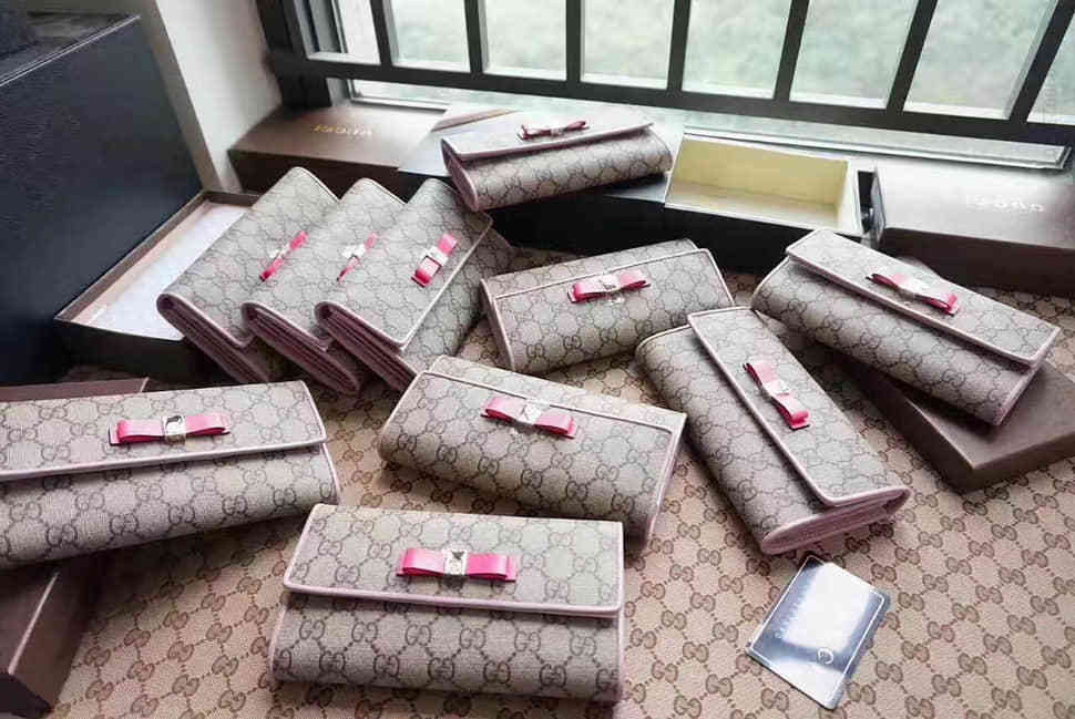 Gucci古驰 388678 帆布双G 蝴蝶结 女士长款按扣钱夾