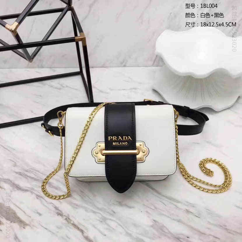 海外代购 普拉达prada cahier小牛皮链条腰包 1BL004白色+黑色