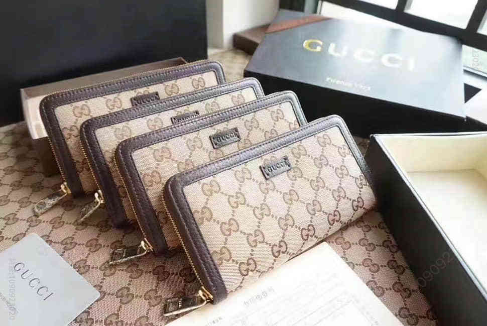 Gucci古驰 黑色双G帆布配牛皮 长款拉链钱包404071