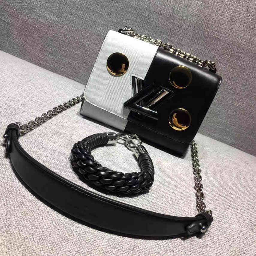 LV Autres cuirs饰钉压纹小牛皮TWIST 小号手袋 M54601