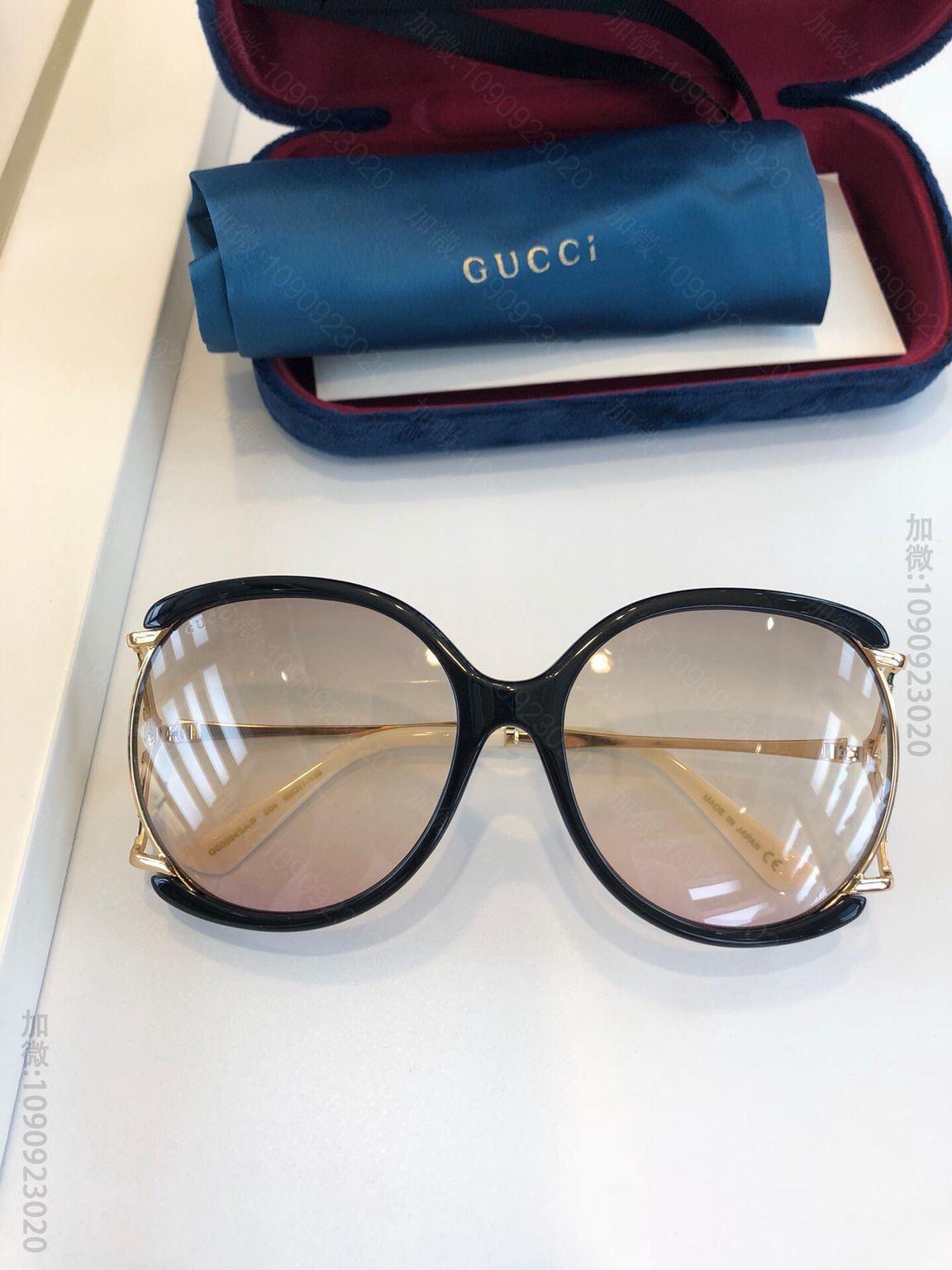 GUCCI古驰女士圆框镂空太阳眼镜