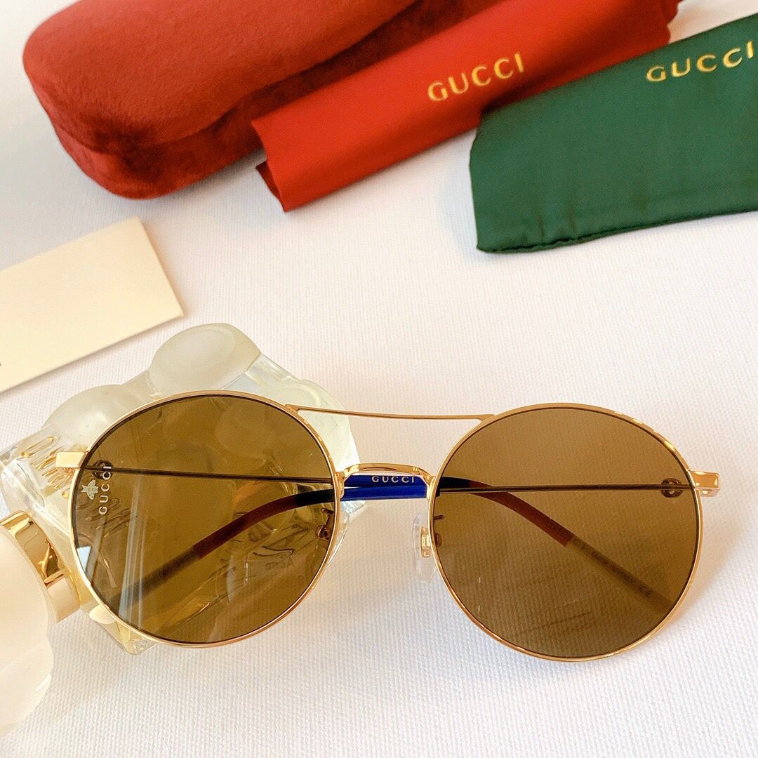 Gucci古驰时尚圆形镜片金色金属太阳眼镜