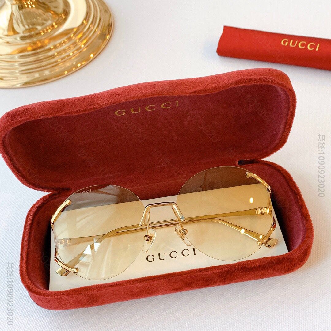 GUCCI古驰独特浅色镜片双G标识女士太阳眼镜